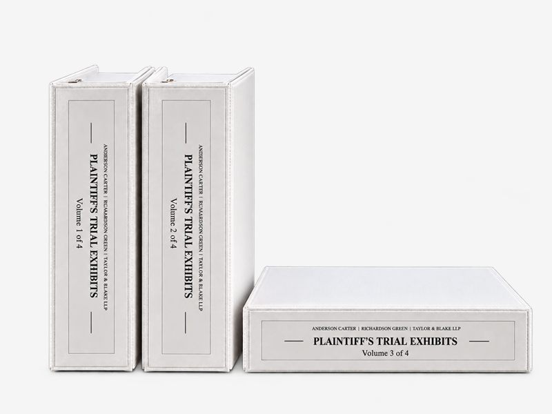 Three white printed trial binders